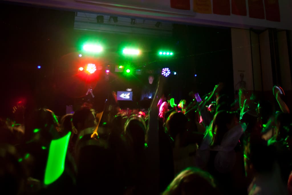 A local DJ playing music at a Calgary school dance