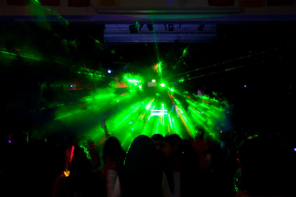 School dance in calgary with a DJ using lasers